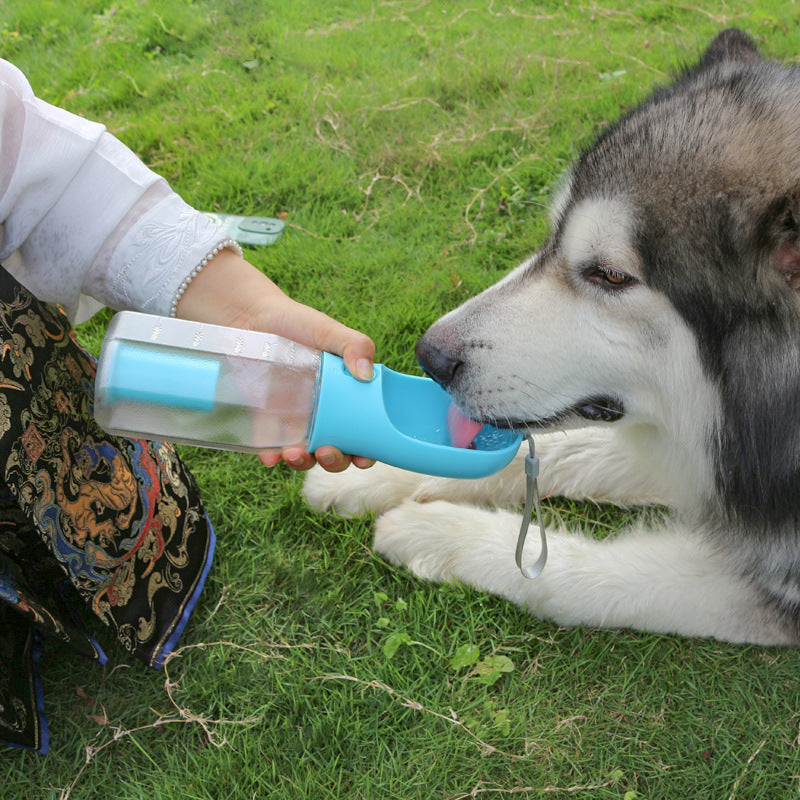 VelvetPaws™ 3-in-1 Travel Hydration Bottle – Water, Food & Poop Bag Dispenser